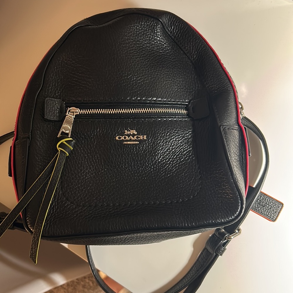 Black coach backpack purse with color trim accents